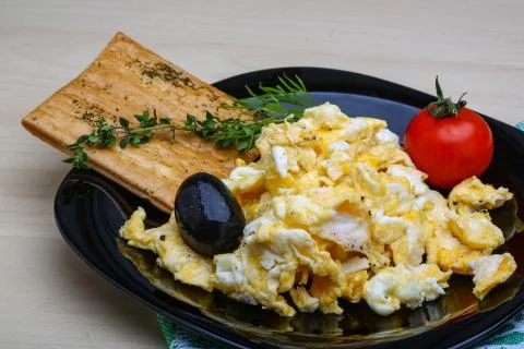 Scrambled eggs with tomato Stock Photos