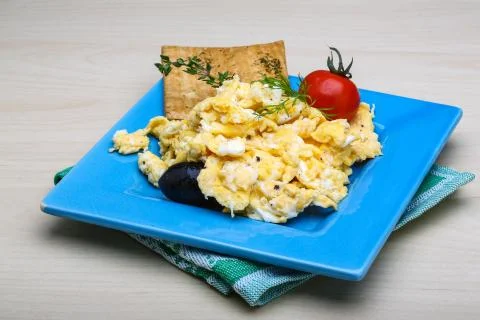 Scrambled eggs with tomato Stock Photos
