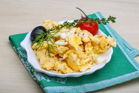 Scrambled eggs with tomato Stock Photos