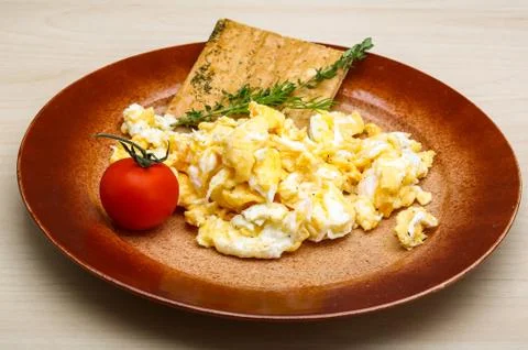 Scrambled eggs with tomato Stock Photos