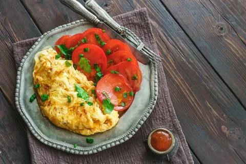 Scrambled eggs with tomatoes Fotos de archivo