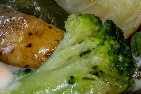 Scrambled eggs with vegetables close-up. Roasted vegetables. Stock Photos