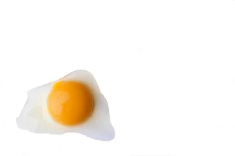 Scrambled eggs on a white background. Fried Broken Egg. Stock Photos