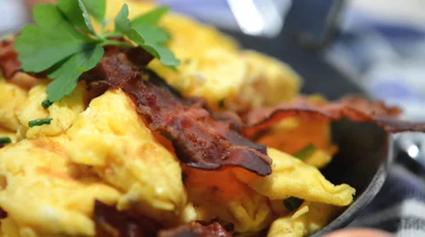 Scrambles eggs with ham (loopable) Stock Footage 33960039
