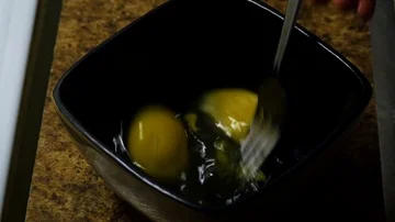 Scrambling Eggs 1 Stock Footage 86156359