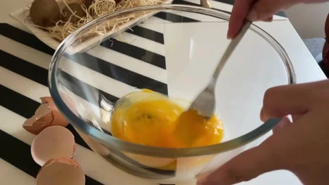 Scrambling Eggs In A Bowl With Fork Stock Footage 166226823