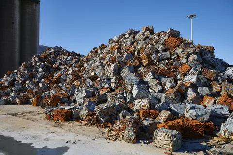 Scrap blocks prepared for export on the dock of the port of Bilbao Stock-Fotos