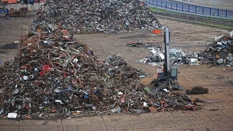 Scrap loader on junkyard Stock Footage 69960168