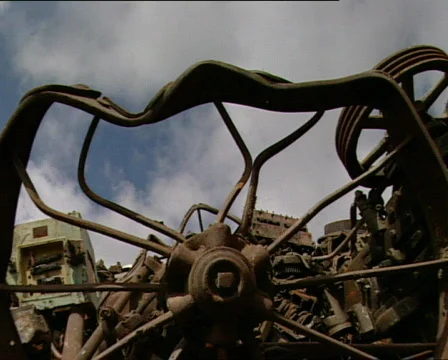 Scrap metal and clouds Stock Footage 299622