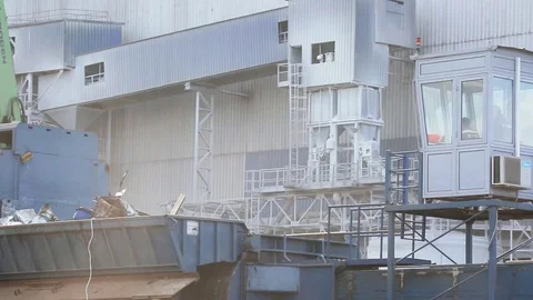 Scrap metal is being moved to the sorting like outside the plant Stock Footage 71590185