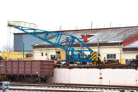 Scrap metal loading, train carrying industrial waste scrap. Recycling concept Stock Photos