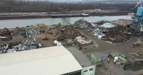 Scrap Recycling Yard With Roll Off Containers, Barge Passing, Aerial View Stock Footage 340644993