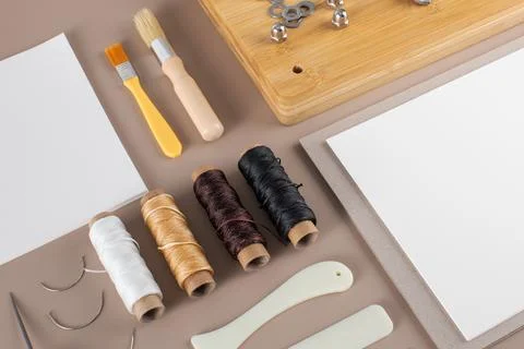 Scrapbooking kit with threads brushes and cutting tools Foto stock