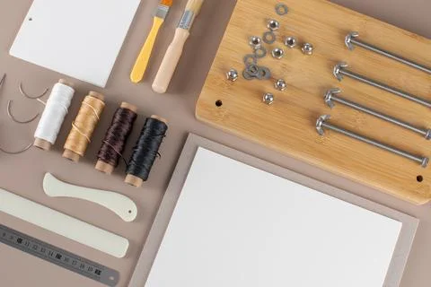 Scrapbooking kit with threads brushes and cutting tools Foto stock