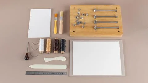 Scrapbooking kit with threads brushes and cutting tools Stock Photos
