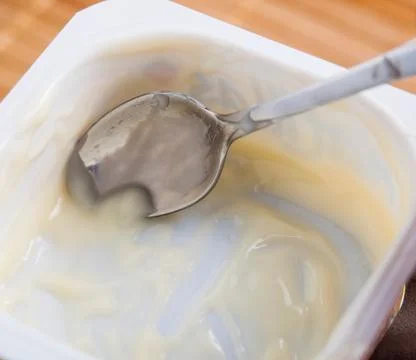 Scrape remnants of custard Stock Photos