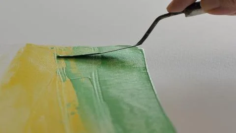 A scraper put color on an easel Stock Photos