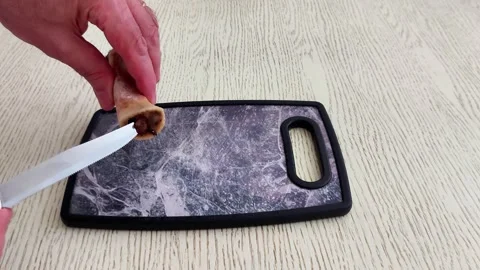 Scraping Bone Marrow on Marble Board for Culinary Prep Stock-Footage 320768452