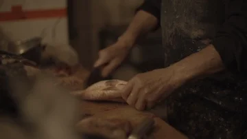 Scraping a fish Stock Footage 85814435