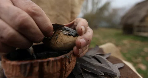 Scraping glue of a neolithic knife 스톡 동영상 61268120