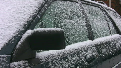 Scraping ice off car. Real time shot. Stock Footage