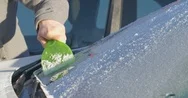 Scraping Ice Off A Car Windshield Stock Footage