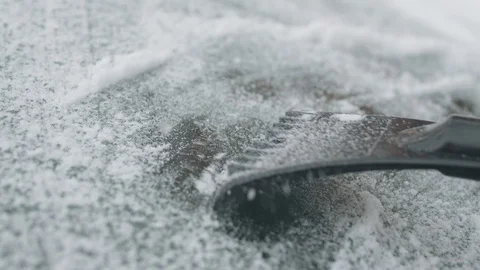 Scraping ice from the windshield Stock-Footage 117402694