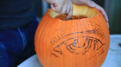 Scraping out Halloween pumpkin Stock Footage 60109203