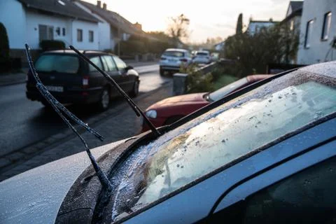 Scraping windscreen during winter Stock Photos