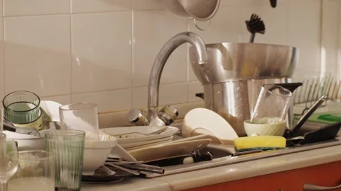Scraps, Bones and goose or chiken skeleton on dirty dishes and mess after a Stock Footage 264464956