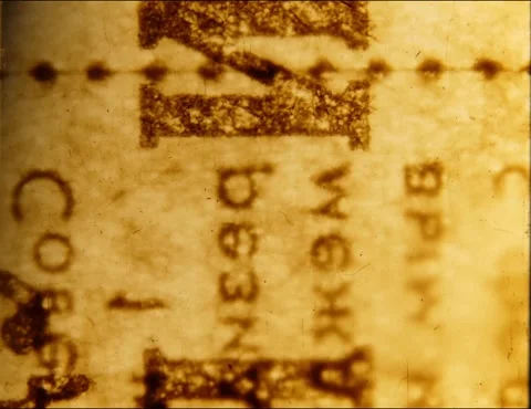 Scraps of an old Soviet newspaper.  Abstract loopable animation. 35mm film 2 Stock-Footage 298338300