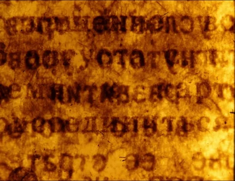 Scraps of an old Soviet newspaper.  Abstract loopable animation. 35mm film 1 Stock-Footage 298338397