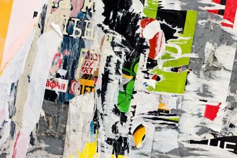 Scraps of posters on wall Foto stock
