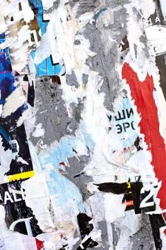 Scraps of posters on wall Stock Photos