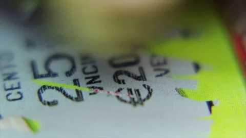 Scratch Card Close Up: Number 25,18 Stock Footage 75070578
