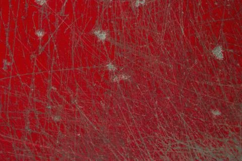 Scratch on the surface of the red desk Stock Photos