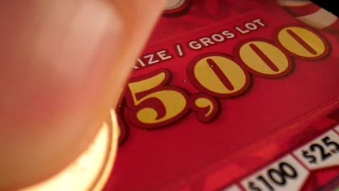 Scratch ticket barcode seventy-five thousand dollars Stock Footage 124443387