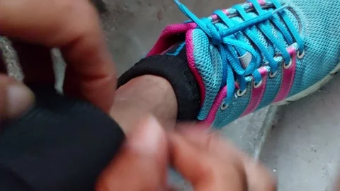 Scratch your ankles with both hands very hard Stock Footage 262527403