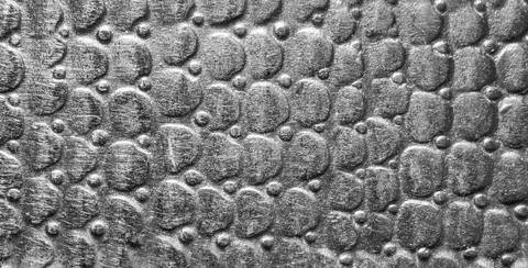 Scratched metal texture with round pattern. Abstract background of steel. B.. Stock Photos