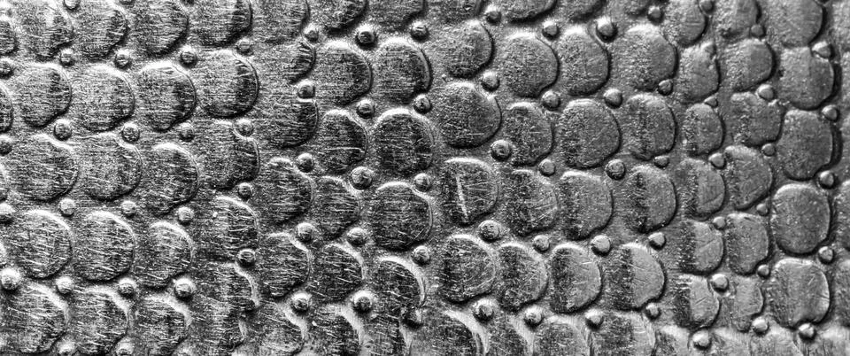Scratched metal texture with round pattern. Abstract background of steel. B.. Foto stock