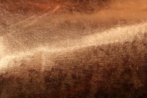 Scratched texture copper plating background close-up Stock Photos