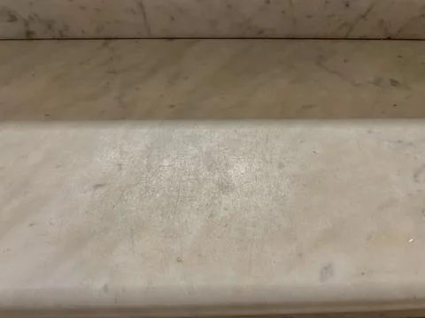 Scratched white marble step Stock Photos