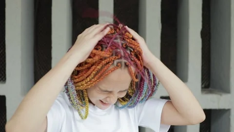 Scratches her head Stock Footage 154662984