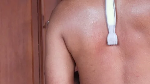 Scratches his back Stock-Footage 333319223