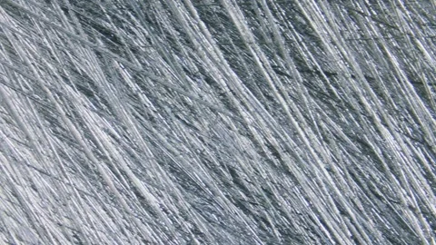 Scratches on stainless steel surface under microscope Stock Footage 324030044