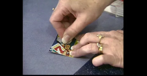 Scratchies and Instant Win Tickets at Newsagent – Australia (1990s) Stock Footage 318947245