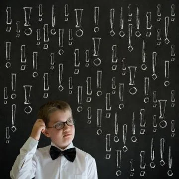 Scratching head thinking boy business man with chalk exclamation marks Stock Photos
