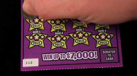 Scratching lotto ticket close up Stock Footage 34462490
