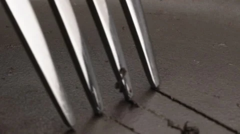 Scratching pan teflon surface with a fork Stock Footage 36911737