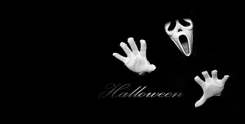 Scream devil costume. Someone in black cover put on white ghost mask on face. Stock Photos